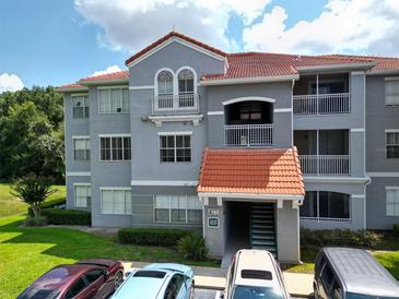 Exterior view of a multi-unit residential building at 18001 Richmond Place Dr # 1122, Tampa, FL 33647