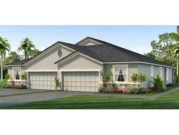 Two-story home with a two car garage, gray exterior, and landscaping at 18337 Cropside Trl, Bradenton, FL 34211