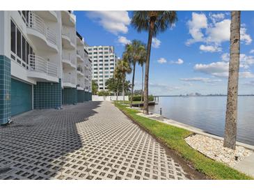 Beautiful waterfront property with palm trees and stunning views of the bay and city skyline at 4950 Bayshore Blvd # 23, Tampa, FL 33611