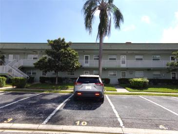 Exterior view of a two-story building with parking at 1433 S Belcher Rd # A9, Clearwater, FL 33764