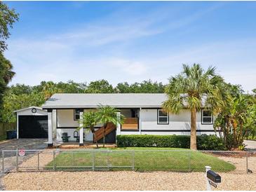 Charming single story home with modern updates and a fenced yard at 9913 Alavista Dr, Gibsonton, FL 33534