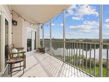 Screened balcony with a relaxing seating area and scenic water views at 6551 Shoreline Dr # 6202, St Petersburg, FL 33708