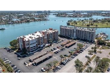 Waterfront condominiums feature covered parking and beautiful bay views at 500 Treasure Island Cswy # 406, Treasure Island, FL 33706