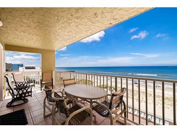 Ocean view balcony with patio furniture at 18610 Gulf Blvd # 402, Indian Shores, FL 33785