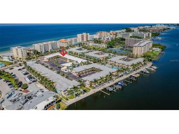 Aerial view of condo building near the waterfront at 19417 Gulf Blvd # E211, Indian Rocks Beach, FL 33785