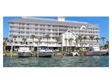 Multi-story waterfront building with boat slips and a desirable location at 445 Hamden Dr # 505, Clearwater Beach, FL 33767
