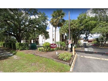 Exterior view of Magnolia Place condo community entrance at 3845 S Lake Dr # 192, Tampa, FL 33614