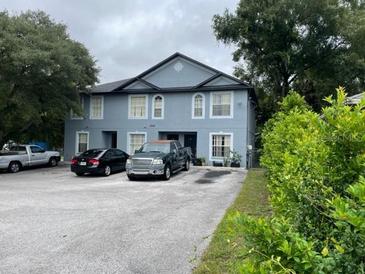 Two-story building with parking in front at 3902 E Yukon St, Tampa, FL 33604