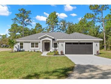 Photo one of 18097 Macassar Rd Weeki Wachee FL 34614 | MLS TB8307127