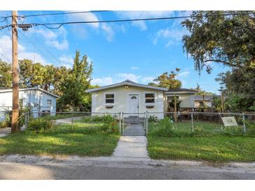 Charming single story home with a well maintained lawn at 906 Jurgens St, Clearwater, FL 33755
