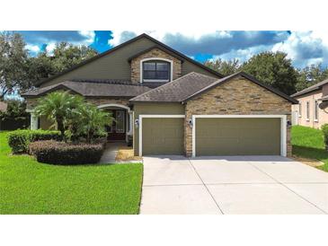 Beautiful two-story house with a two-car garage at 2727 Colewood Ln, Dover, FL 33527