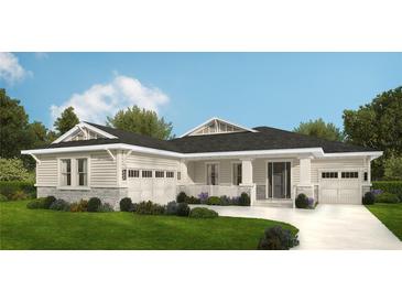 Charming single Gathering home boasts a two-car garage, landscaped lawn, and stylish architectural design at 4729 Majestic Hills Loop, Brooksville, FL 34601