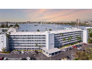 Aerial view of a waterfront building with parking at 1868 Shore S Dr # 207, South Pasadena, FL 33707