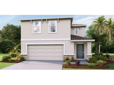 Two-story house with light beige walls, gray door, and a two-car garage at 5275 Salt Marsh Rd, Wimauma, FL 33598