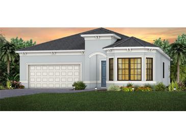 Stunning curb appeal with a charming two-story house and landscaped yard at 4943 Ribbon Rock Cv, Lakewood Ranch, FL 34211