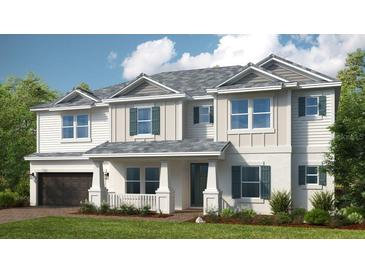 Two-story house with gray roof, white siding, and green shutters at 16285 Alpha Grove Pl, Odessa, FL 33556