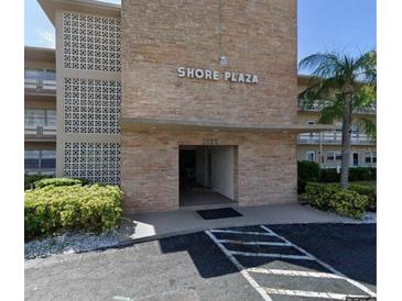 Shore Plaza building, featuring a classic design and convenient entryway at 1893 S Shore Drive Dr # 209, South Pasadena, FL 33707