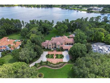 Luxury waterfront home with expansive grounds at 7734 Still Lakes Dr, Odessa, FL 33556
