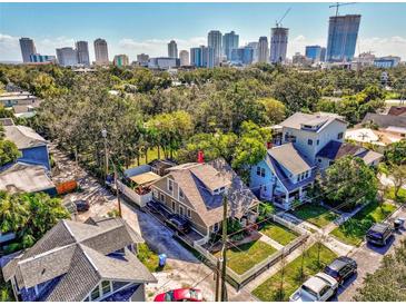 Aerial view of houses and cityscape in the background at 615 Grove N St, St Petersburg, FL 33701