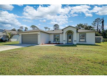 One-story home with attached garage at 3776 Junction St, North Port, FL 34288