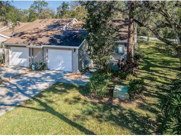 Two-unit condo with private driveways at 4399 Brooker Creek Dr, Palm Harbor, FL 34685