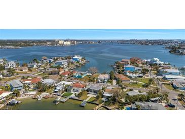 Aerial view of waterfront homes and neighborhood at 406 161St Ave, Redington Beach, FL 33708