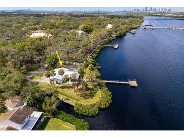 Single-Gathering home on waterfront lot with private dock at 505 S 56Th St, Tampa, FL 33619