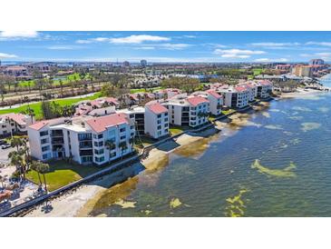 Condo building along waterfront with beach and boat slips at 5825 Puerta Del Sol S Blvd # 170, St Petersburg, FL 33715