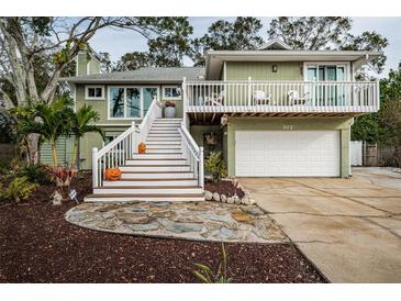 Two-story home with charming curb appeal at 302 Lagoon Dr, Palm Harbor, FL 34683