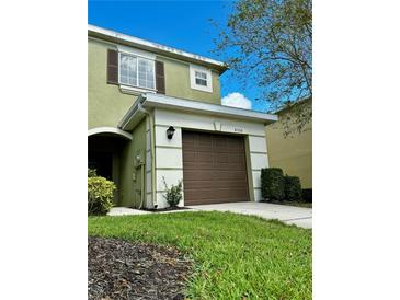 Two-story townhome with attached garage at 8550 Trail Wind Dr, Tampa, FL 33647
