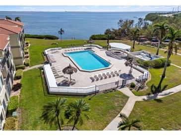Elevated view of waterfront pool and lounge area at 6372 Palma Del Mar S Blvd # 320, St Petersburg, FL 33715