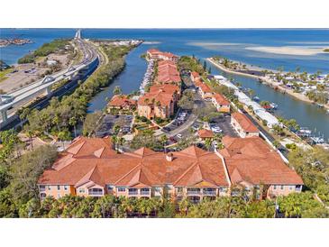 Beautiful waterfront condo community with lush landscaping and stunning views at 5000 Culbreath Key Way # 4-204, Tampa, FL 33611