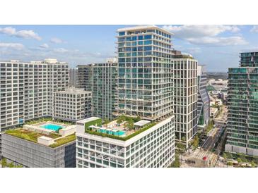 Aerial view of a modern high-rise building at 1000 Water St # 1702, Tampa, FL 33602