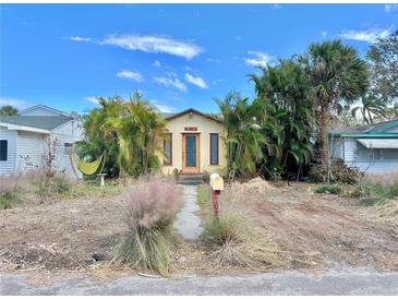 Charming bungalow-style home with a landscaped yard at 3020 Clinton S St, Gulfport, FL 33707
