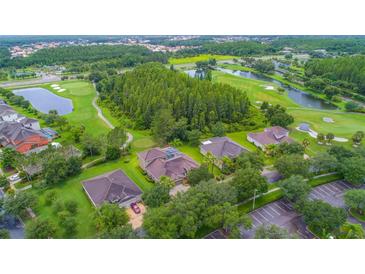Aerial view of a house on a golf course community at 10645 Plantation Bay Dr, Tampa, FL 33647
