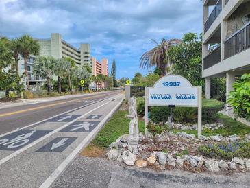 Welcoming entrance to Indian Sands community at 19937 Gulf Blvd # B3, Indian Shores, FL 33785