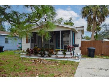 Charming one-story home with screened porch and landscaped yard at 1753 Maryland Ne Ave, St Petersburg, FL 33703