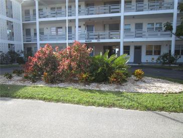 Building exterior with landscaping and parking at 6000 20Th N St # 129, St Petersburg, FL 33714
