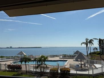 Community pool with scenic bay views, perfect for relaxation at 6268 Palma Del Mar Blvd S # 215, St Petersburg, FL 33715