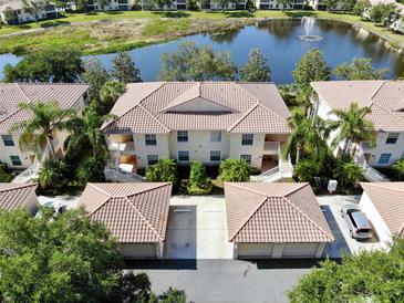 Attractive condo building with lakefront access and garages at 4244 Vicenza Dr # D, Venice, FL 34293