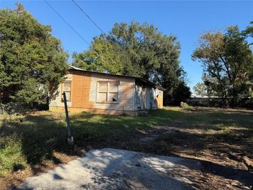 Small house with yard needing renovation at 14348 Graham St, Dade City, FL 33523