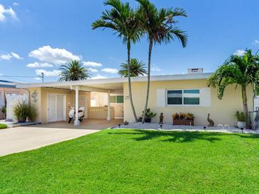 Charming single story home with a well manicured lawn at 16126 4Th E St, Redington Beach, FL 33708