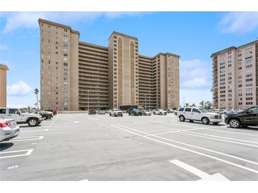 A tall residential building with ample parking in front at 5200 Brittany S Dr # 1708, St Petersburg, FL 33715