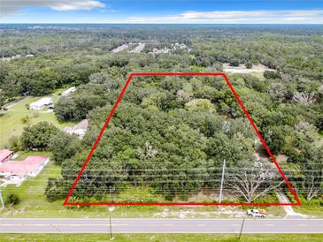 Aerial view of wooded lot, ready to build at 16206 Boyette Rd, Riverview, FL 33579