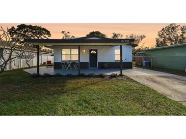 Charming bungalow with modern updates and covered porch at 4190 67Th N Ave, Pinellas Park, FL 33781