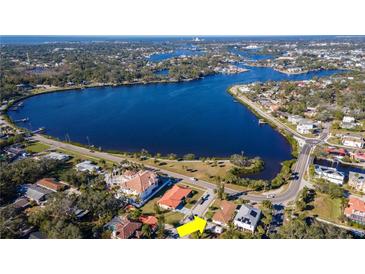 Aerial view showing home's location on waterfront property with canal access at 603 Virginia Ave, Tarpon Springs, FL 34689