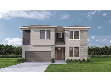 Two-story home with modern facade and attached garage at 804 W Peninsular St, Tampa, FL 33603