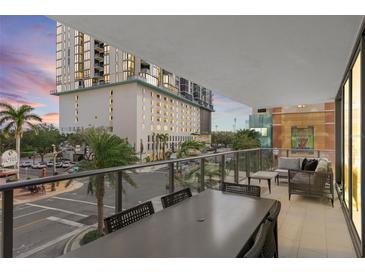 Spacious balcony with city views and seating area at 100 1St N Ave # 201, St Petersburg, FL 33701