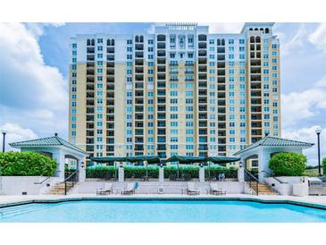 Exterior of building with inviting pool and seating area at 345 Bayshore Blvd # 1603, Tampa, FL 33606