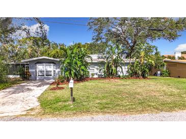 Charming single story home with landscaped yard and driveway at 2358 Havana Dr, Clearwater, FL 33764